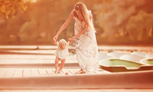 Mother and baby walking milestone