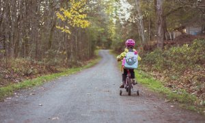 Child riding with backpack