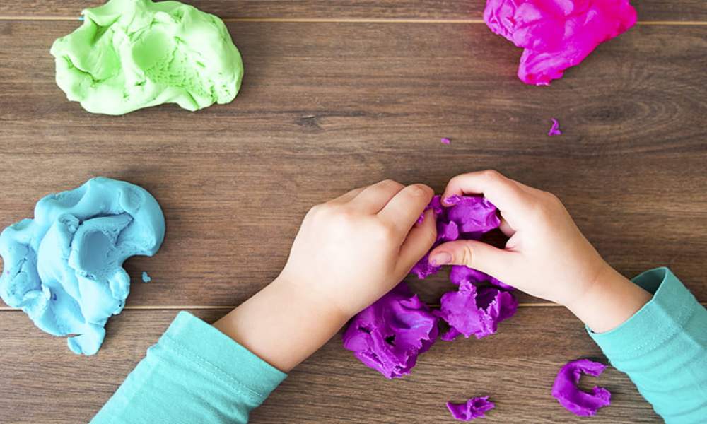 Child playing with playdough