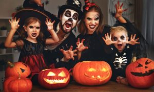 A family dressed up for Halloween.