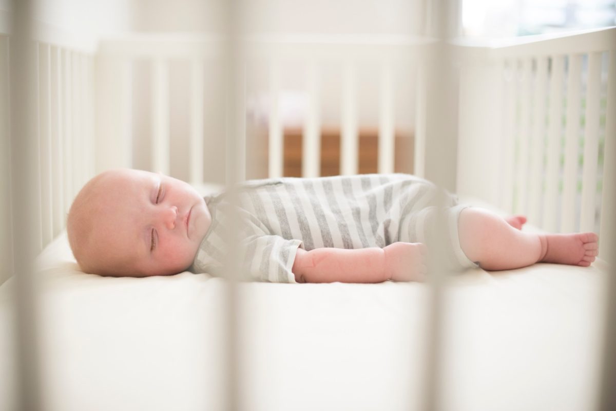 Newborn wont sleep in hot sale crib