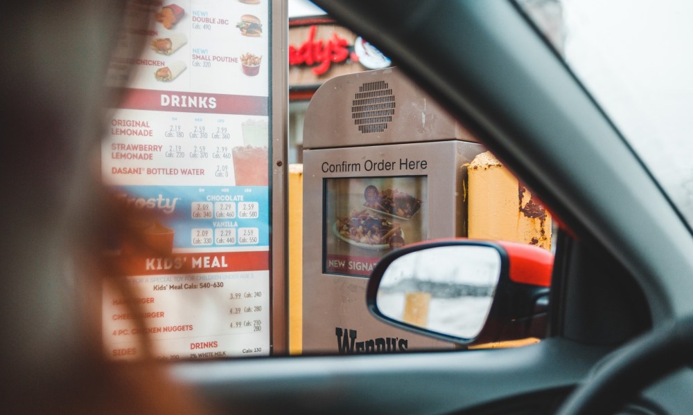 Car in fast-food drive-thru