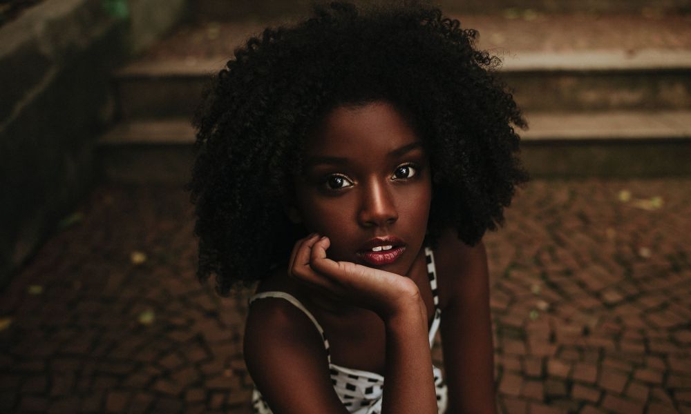 Young girl staring into a camera