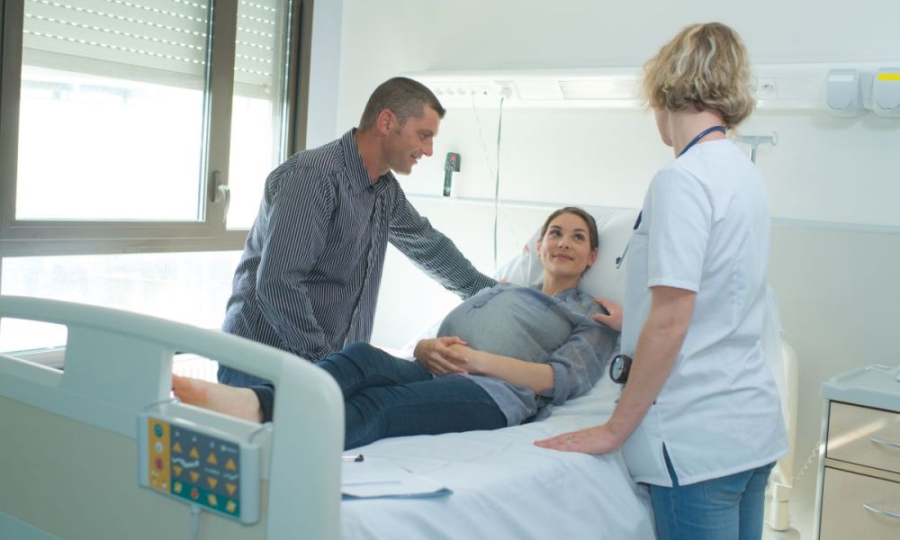 Pregnant woman in labor at hospital.