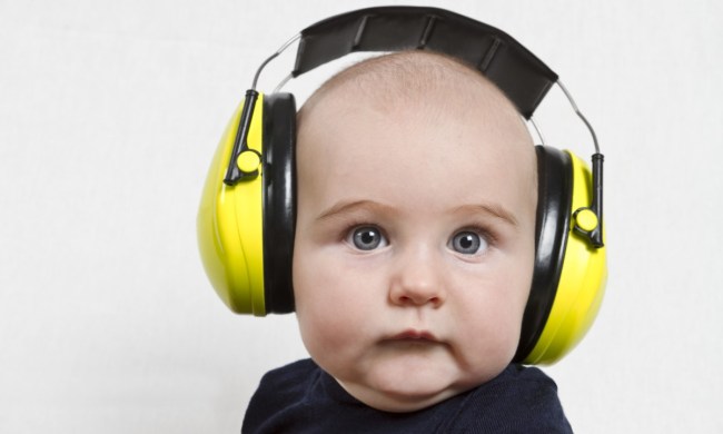 Baby with noise-canceling headphones