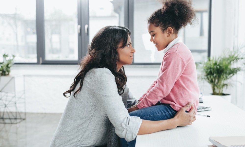 Mother and daughter talking.