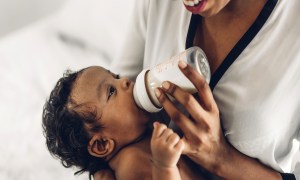 Mother feeding baby.