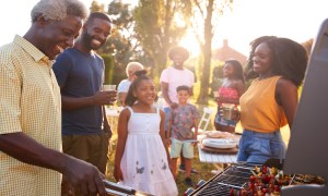 Family grilling together