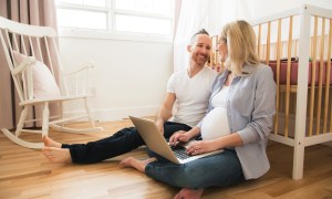 Couple sitting in the nursery