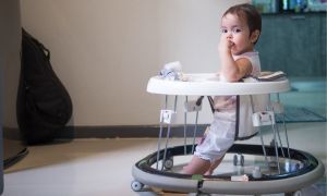 Infant in baby walker