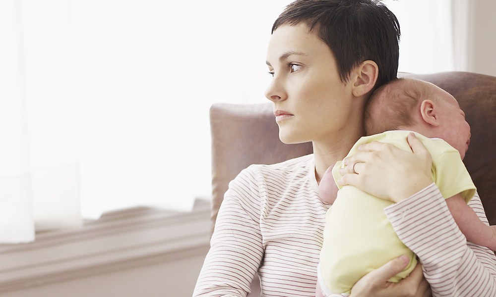 A mom holding a newborn