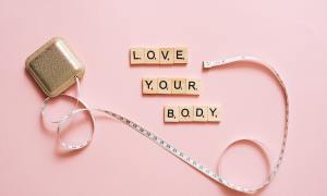 small tiles that say love your body