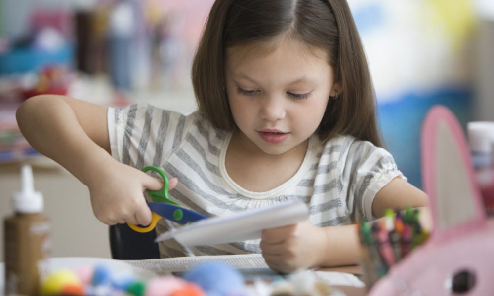 A child doing a craft