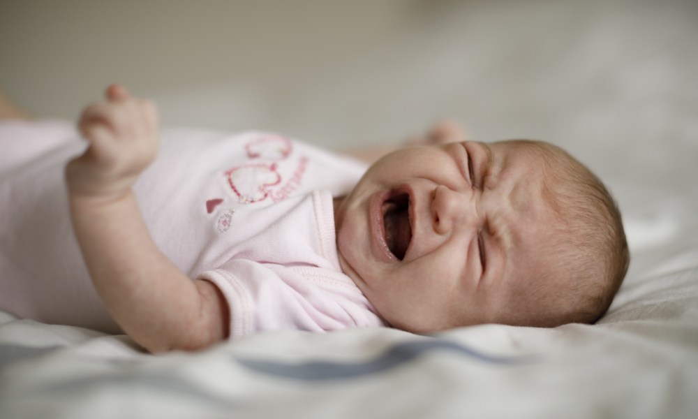 Newborn baby girl crying