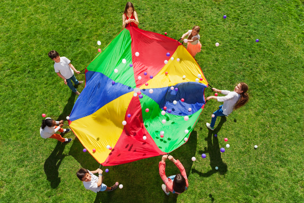 3 Fun Parachute Games for Your Next Park Playdate | NewFolks