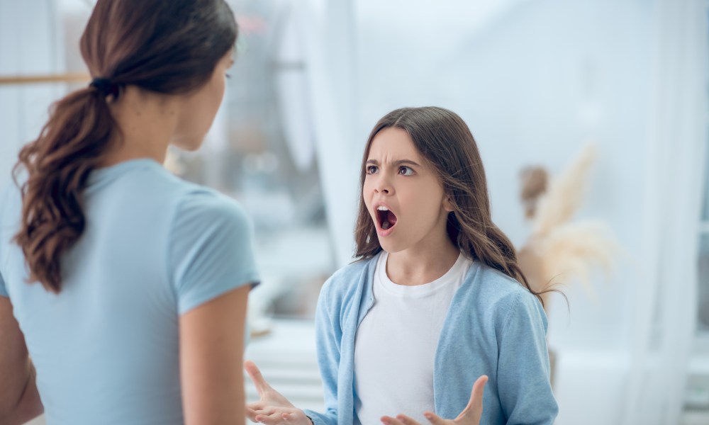 Teen girls arguing with her mom