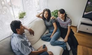 Parents having a talk with their teen.