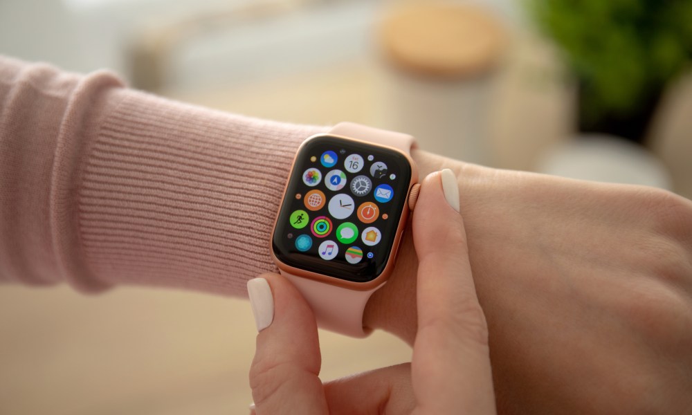 A person checking their Apple watch.