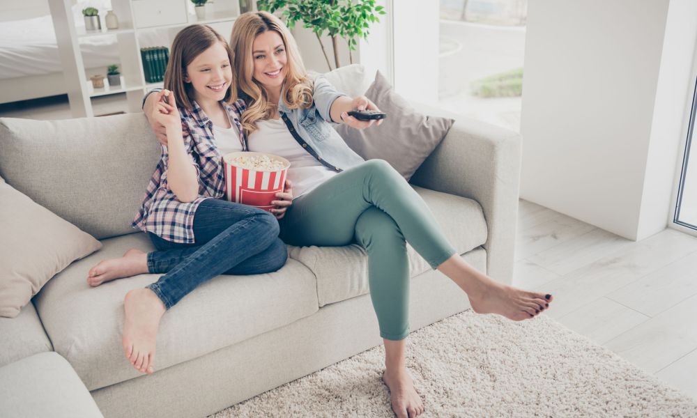 Mom and teen watching TV