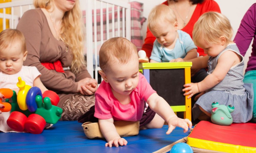 Four babies at daycare