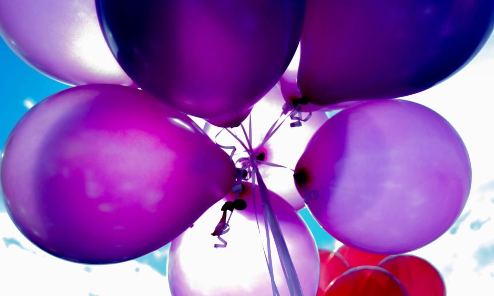 bunch of purple balloons for a Taylor Swift birthday party