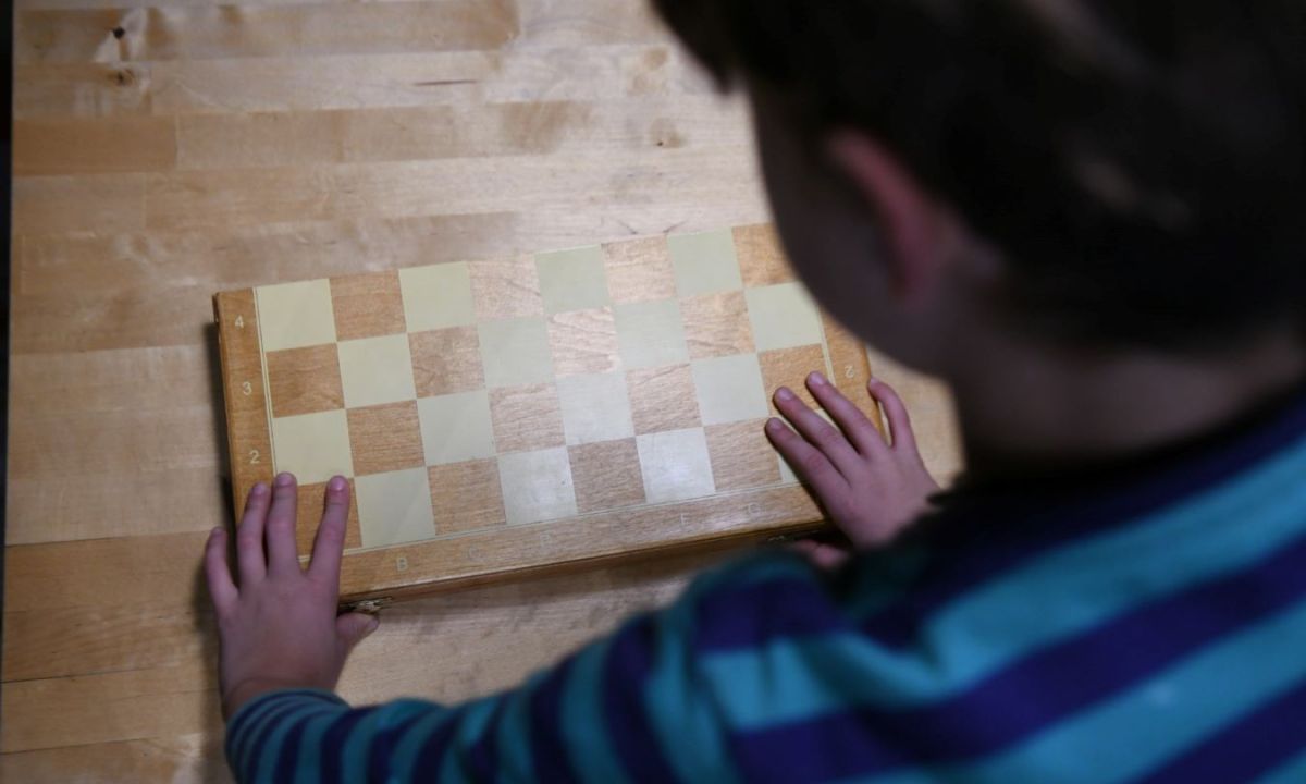 games for kids at home boy playing chess