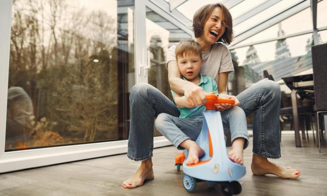 A mother and son playing together.