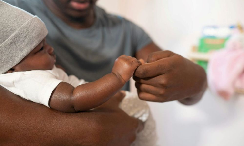 daycare for infants dad holding infant